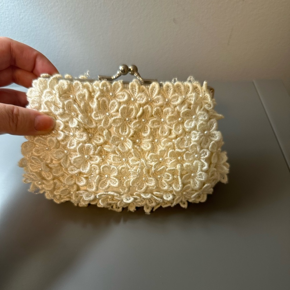 La Regale white floral formal clutch